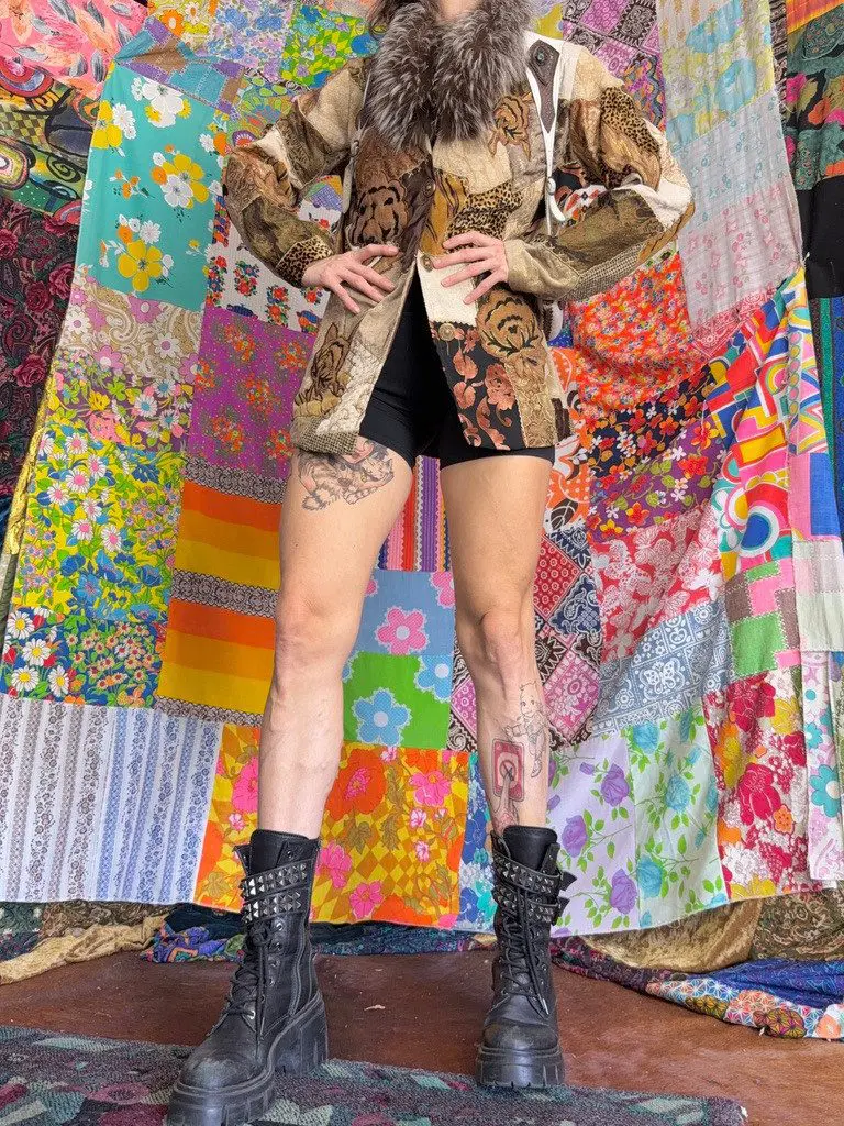 Person with tattoos, patterned jacket, combat boots