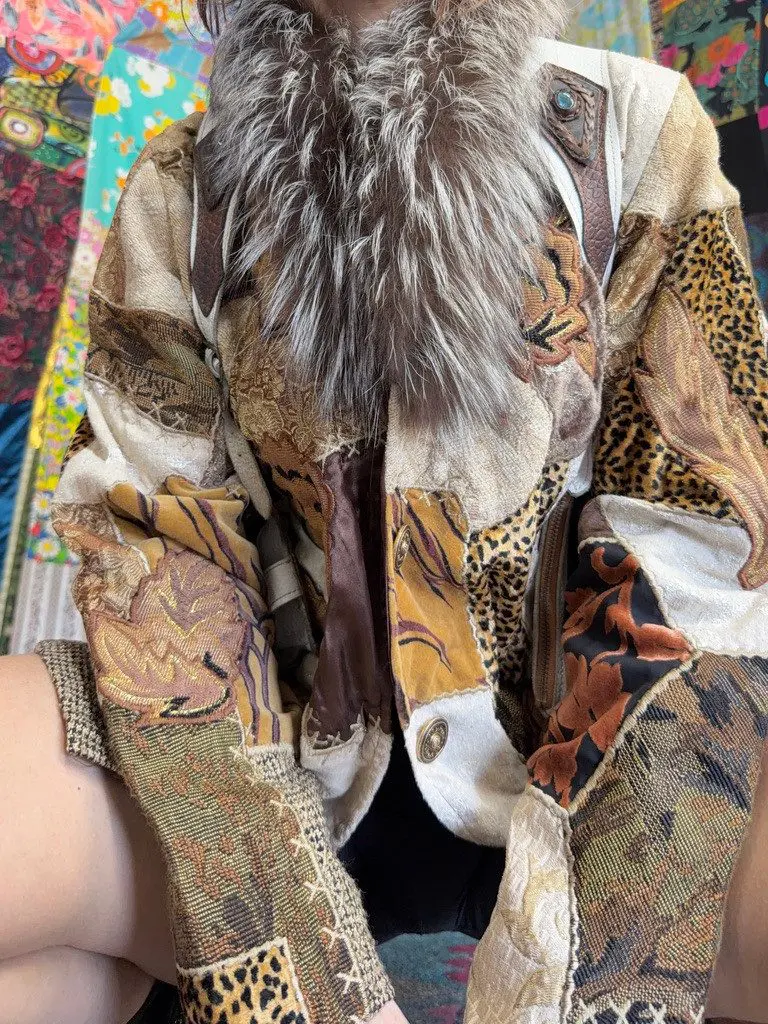 Ornate patchwork jacket with fur collar