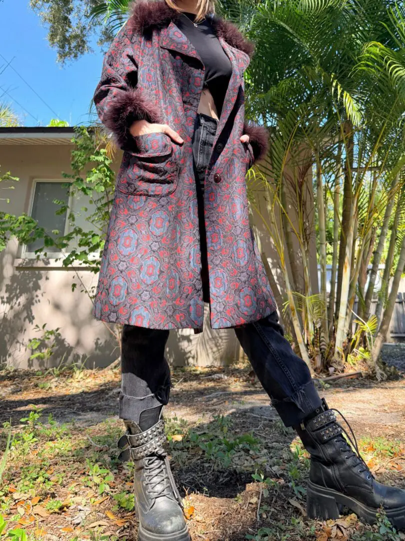 Long patterned coat with chunky black boots