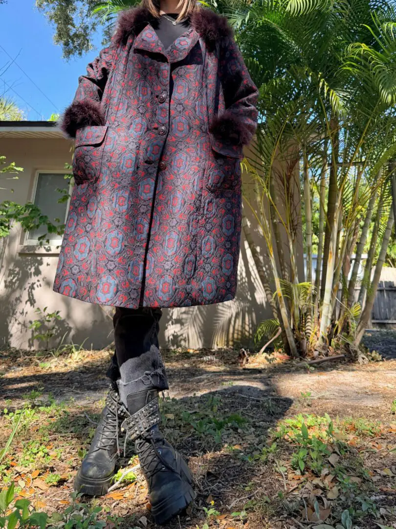 Patterned fur-trimmed coat and chunky boots