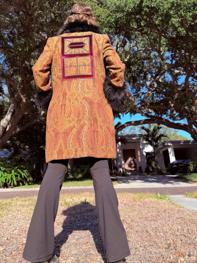 Back view of ornate paisley coat